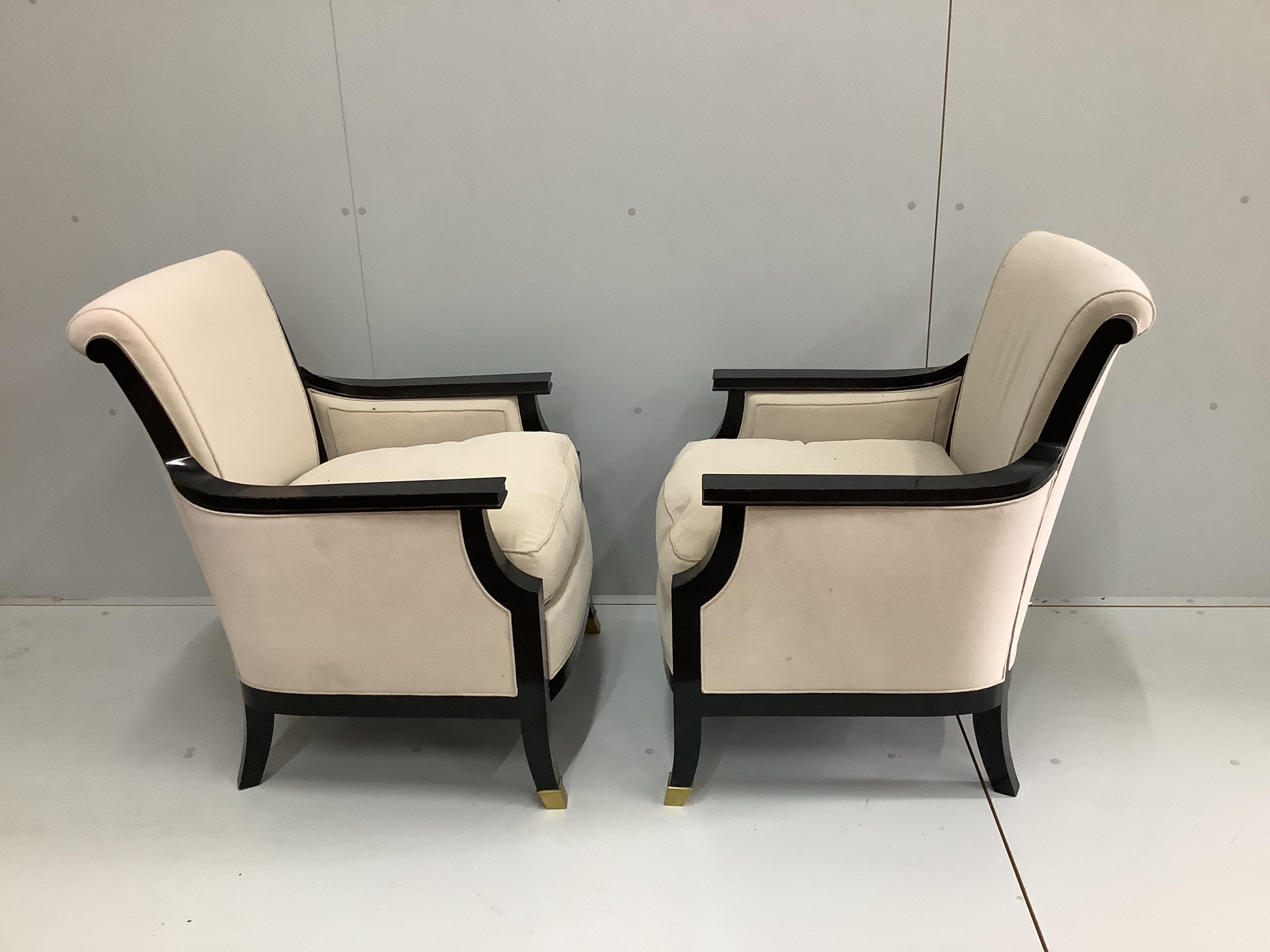 A pair of mid century French Maison Jansen ebonised armchairs with suede effect upholstery, width 68cm, depth 62cm, height 90cm (Bought by the current owner from Galerie Andre Hayat, Paris approximately seven years ago)